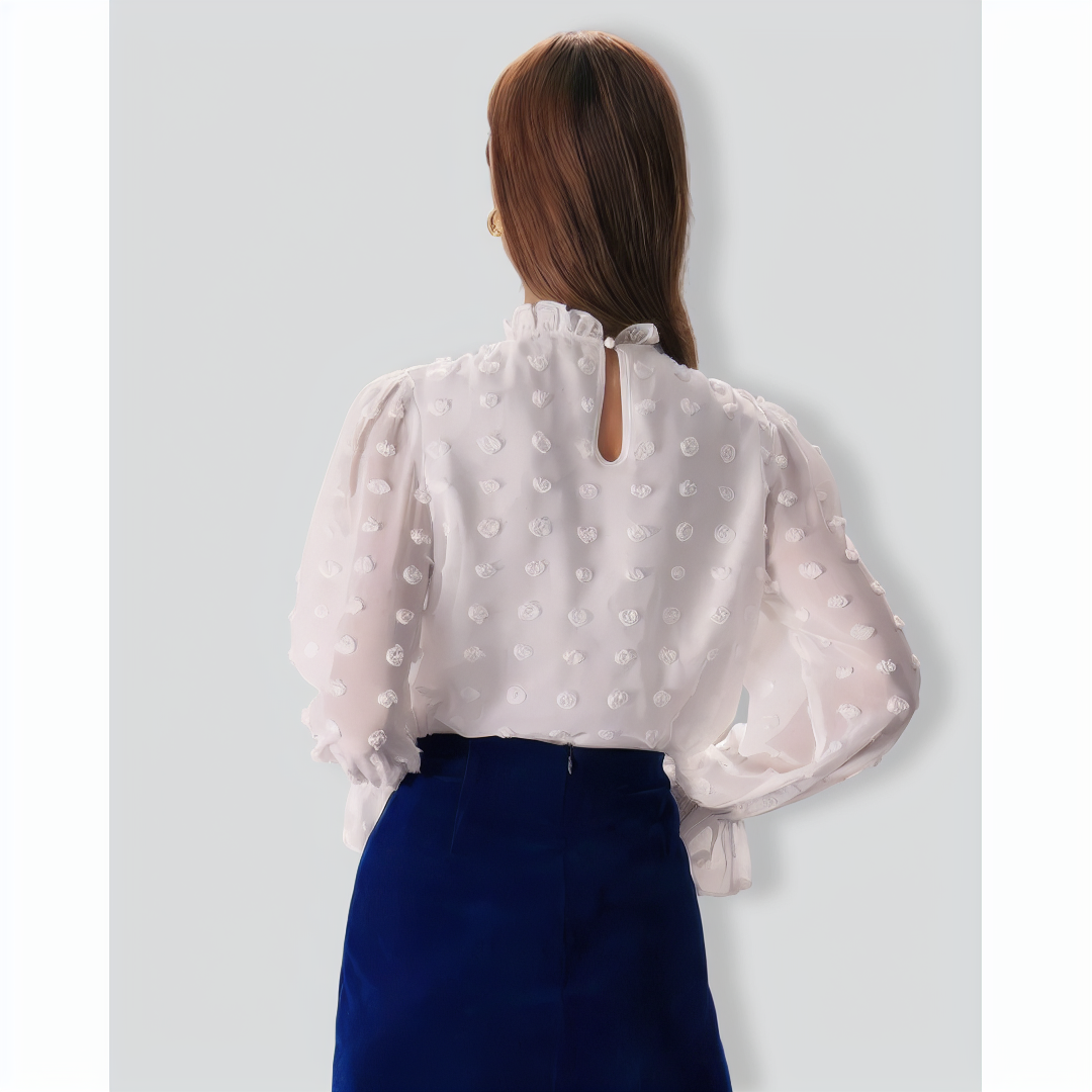 The White Mock Neck Dobby Sheer Blouse